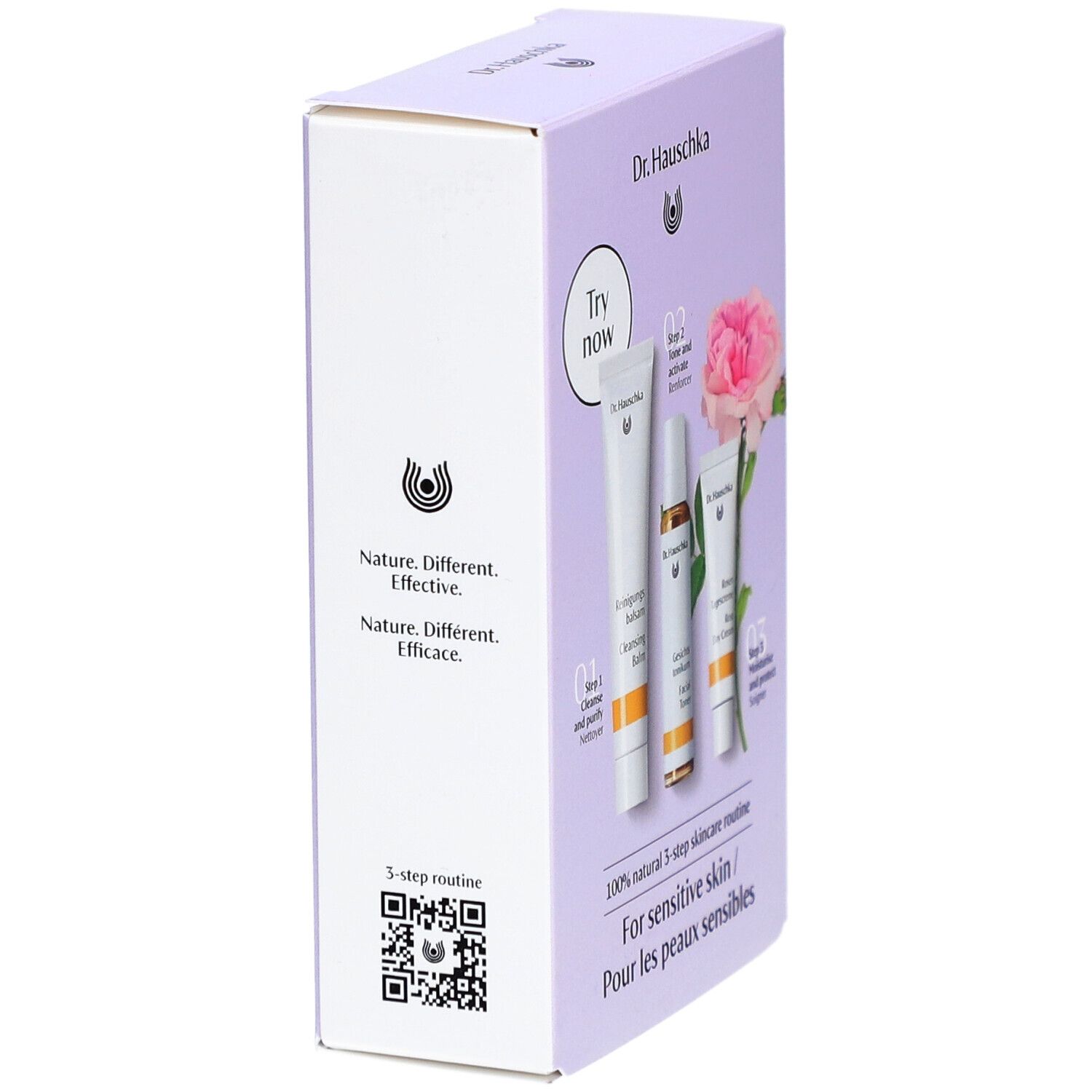 Emballage du kit Dr. Hauschka. Boîte violette avec images et texte. Contient 3 produits pour peaux sèches et sensibles.