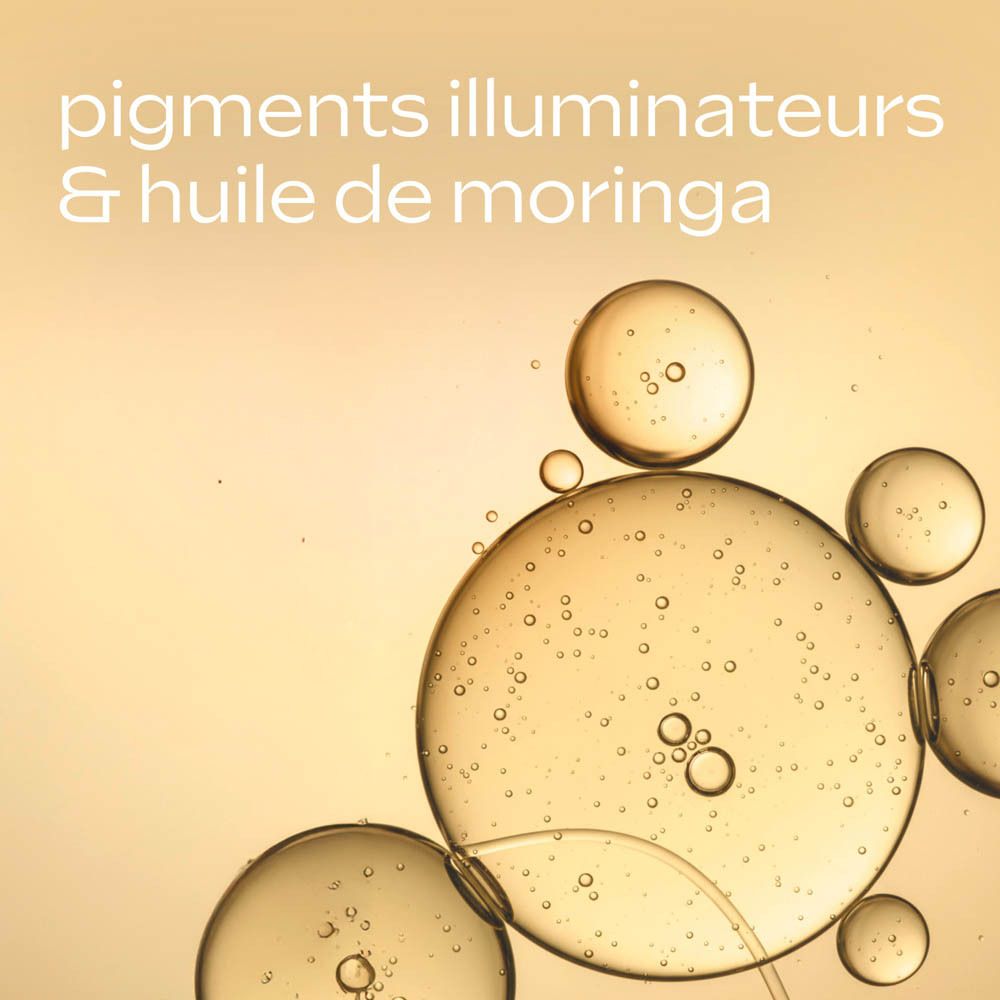 Gros plan de liquides. Texte : pigments illuminateurs & huile de moringa.