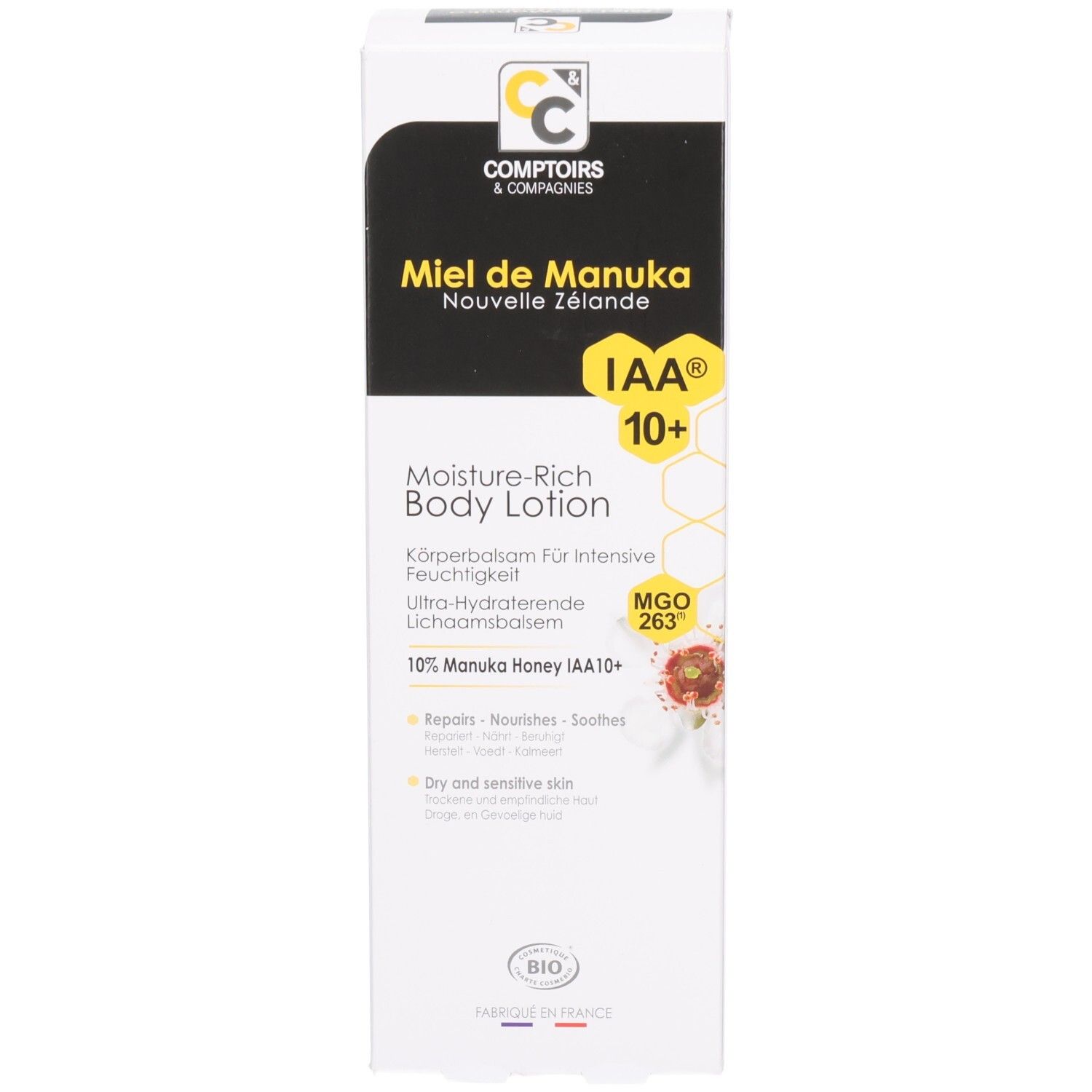 Produktverpackung. Text: Miel de Manuka, Moisture-Rich Body Lotion, 10% Manuka Honey. Weißer Karton.