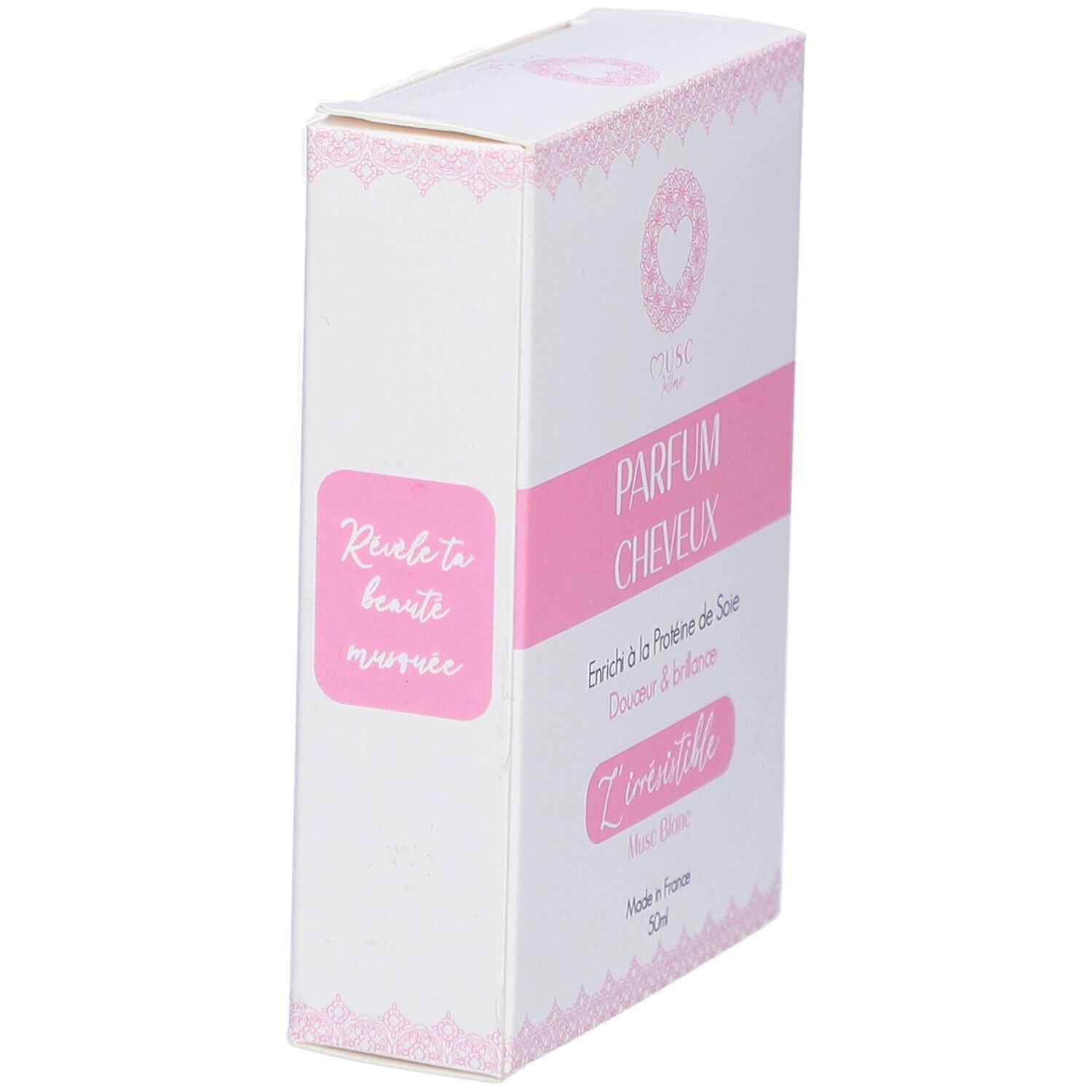 Karton, weiß mit rosa Akzenten. Text: PARFUM CHEVEUX, L'irrésistible, Musc Blanc, Made in France, 30ml.