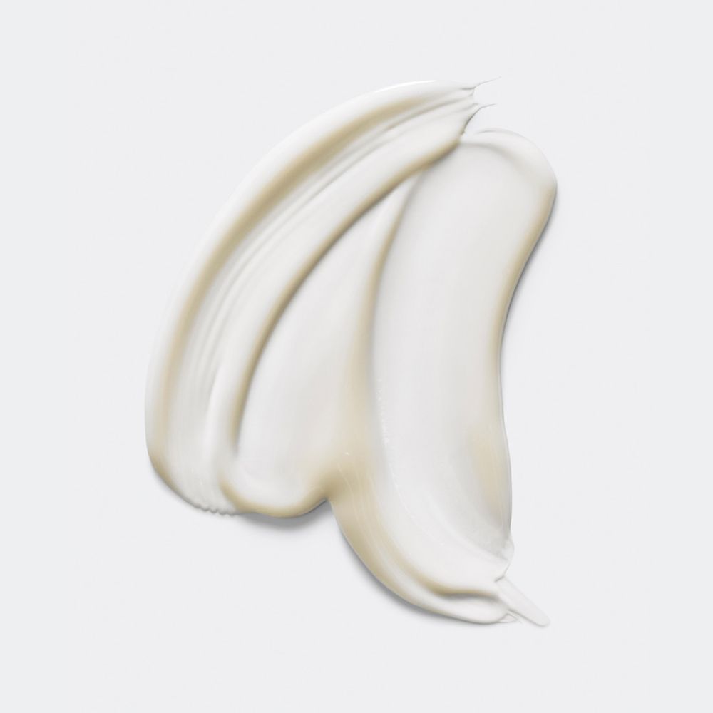Weißes Serum, cremige Textur. Auf hellem Hintergrund. Produktname oder Marke nicht sichtbar.