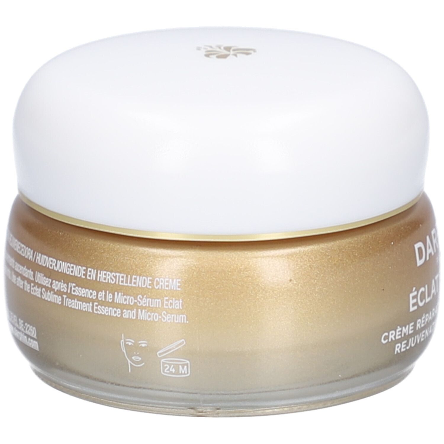 Creme-Glas mit weißem Deckel. Goldfarbene Creme. Beschriftung: DERMAFORA ÉCLAT SUBLIME Crème Réparation Revitalisante.