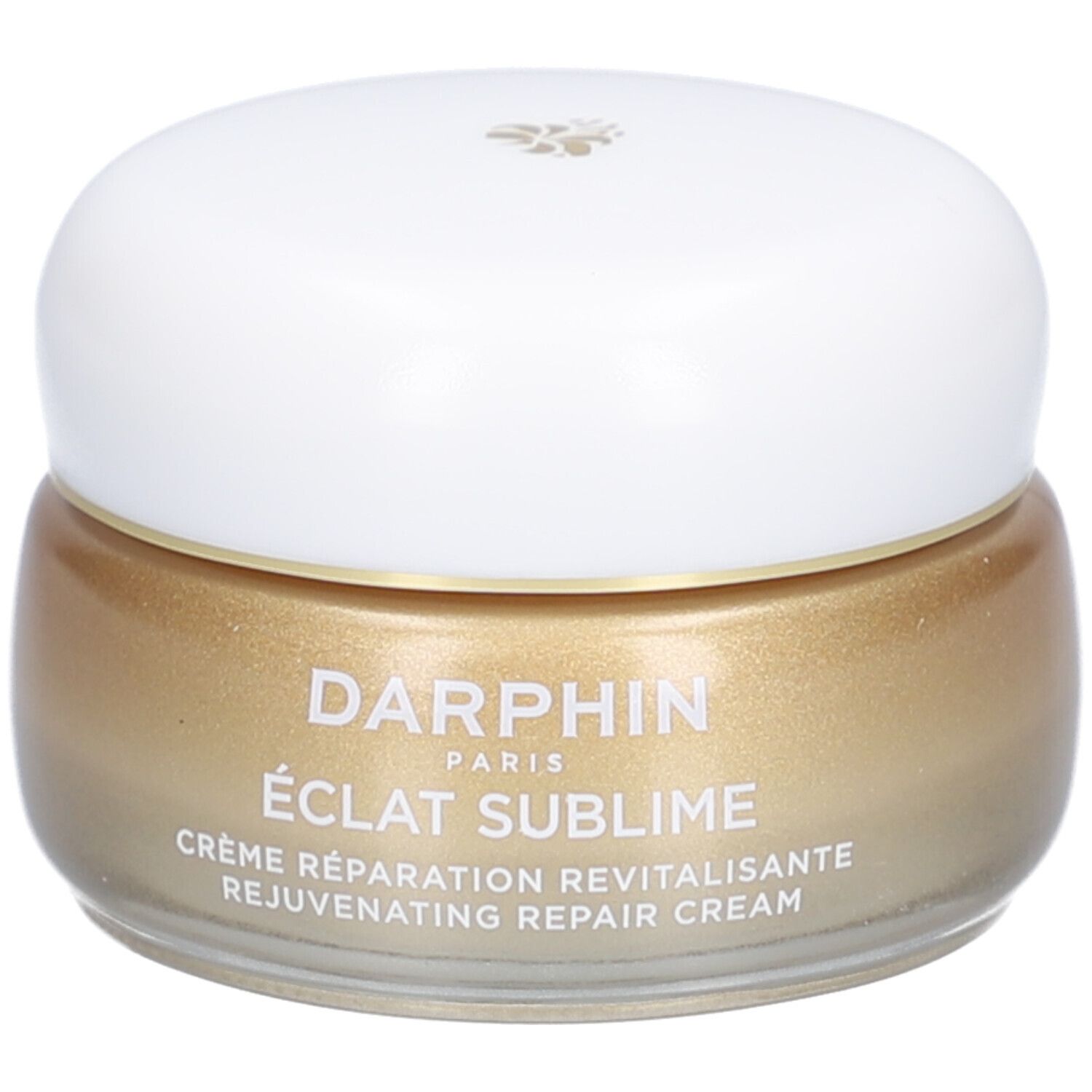 Creme-Glas mit weißem Deckel. Goldfarbene Creme. Beschriftung: DERMAFORA ÉCLAT SUBLIME Crème Réparation Revitalisante.
