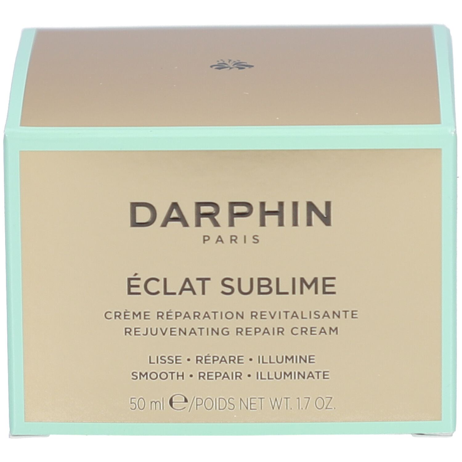 Schachtel. Goldfarbene Schachtel. Beschriftung: DERMAFORA ÉCLAT SUBLIME Crème Réparation Revitalisante.