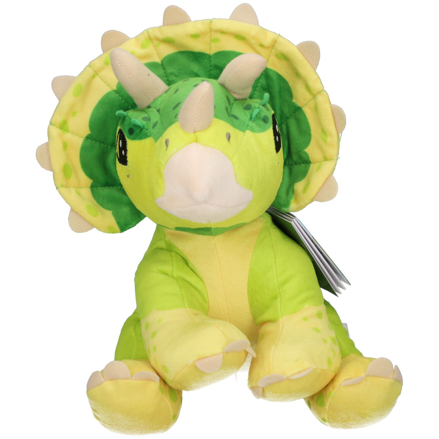 Ein grünes und gelbes Triceratops-Plüschtier. Es hat Hörner, einen Kragen und Pfoten. Ein Etikett ist am Produkt befestigt.