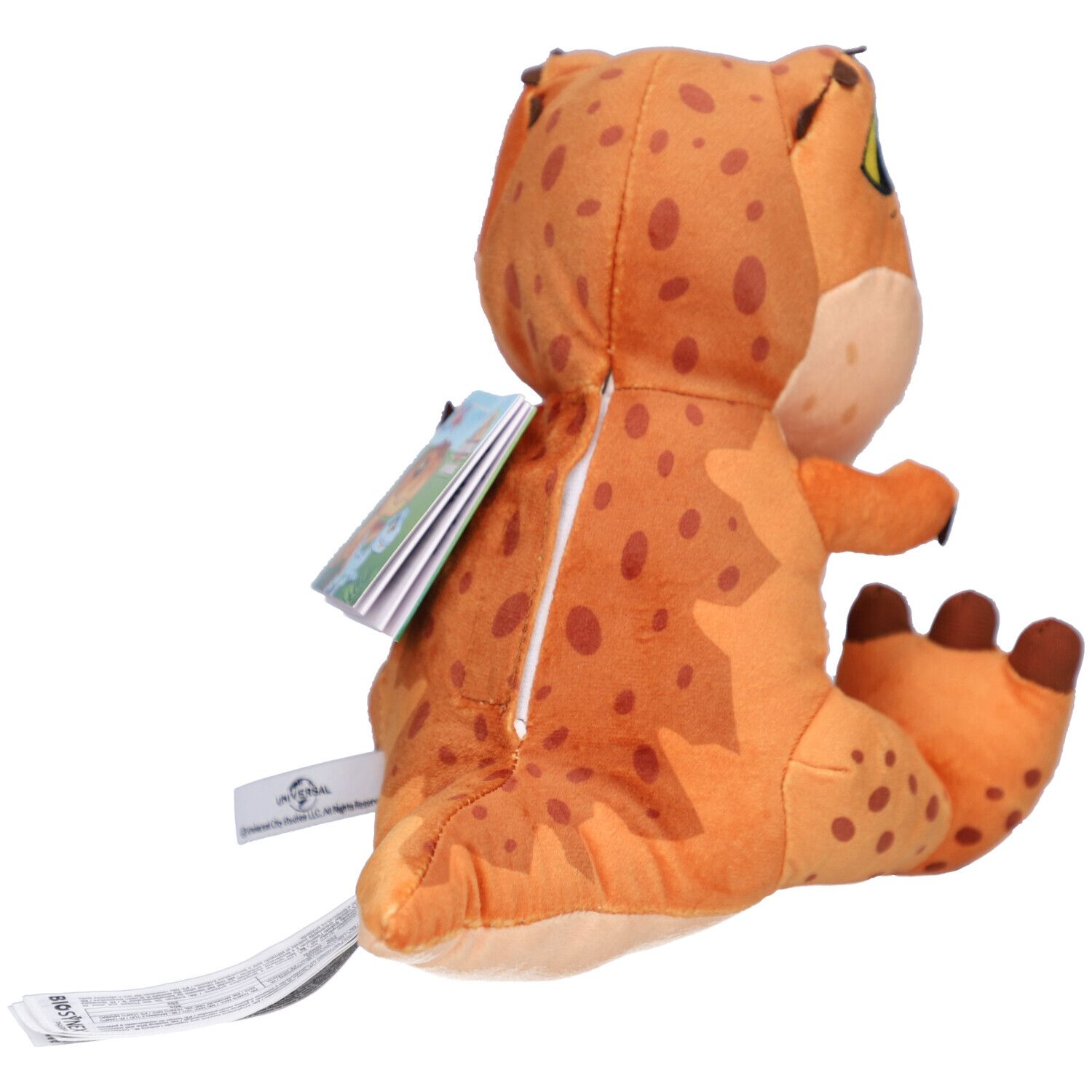 Rückansicht eines orangefarbenen T-Rex-Plüschtiers mit Reißverschluss. Ein Etikett ist am Produkt befestigt.