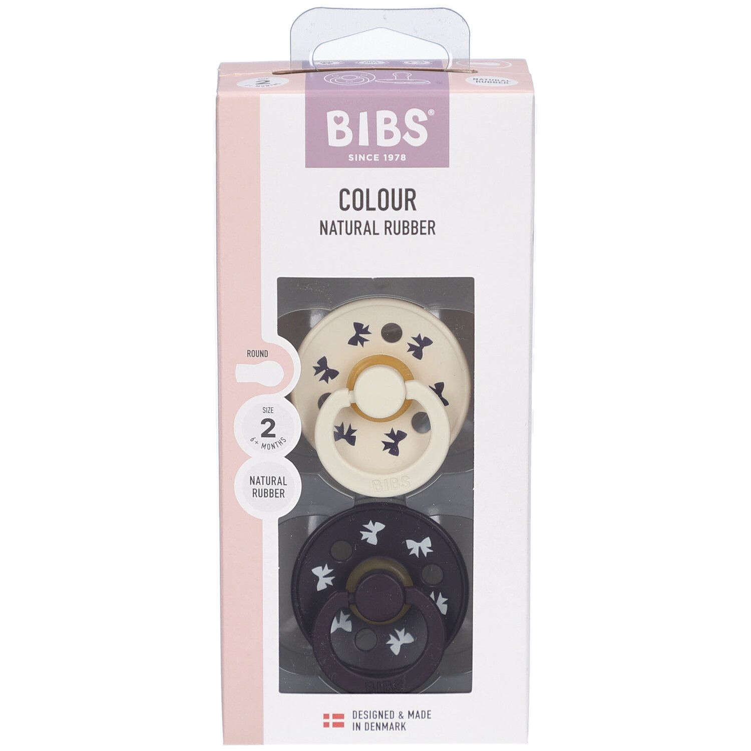 Verpackung mit zwei Schnullern. Sichtbar: cremefarbener und dunkelblauer Schnuller mit Muster. Marke BIBS.