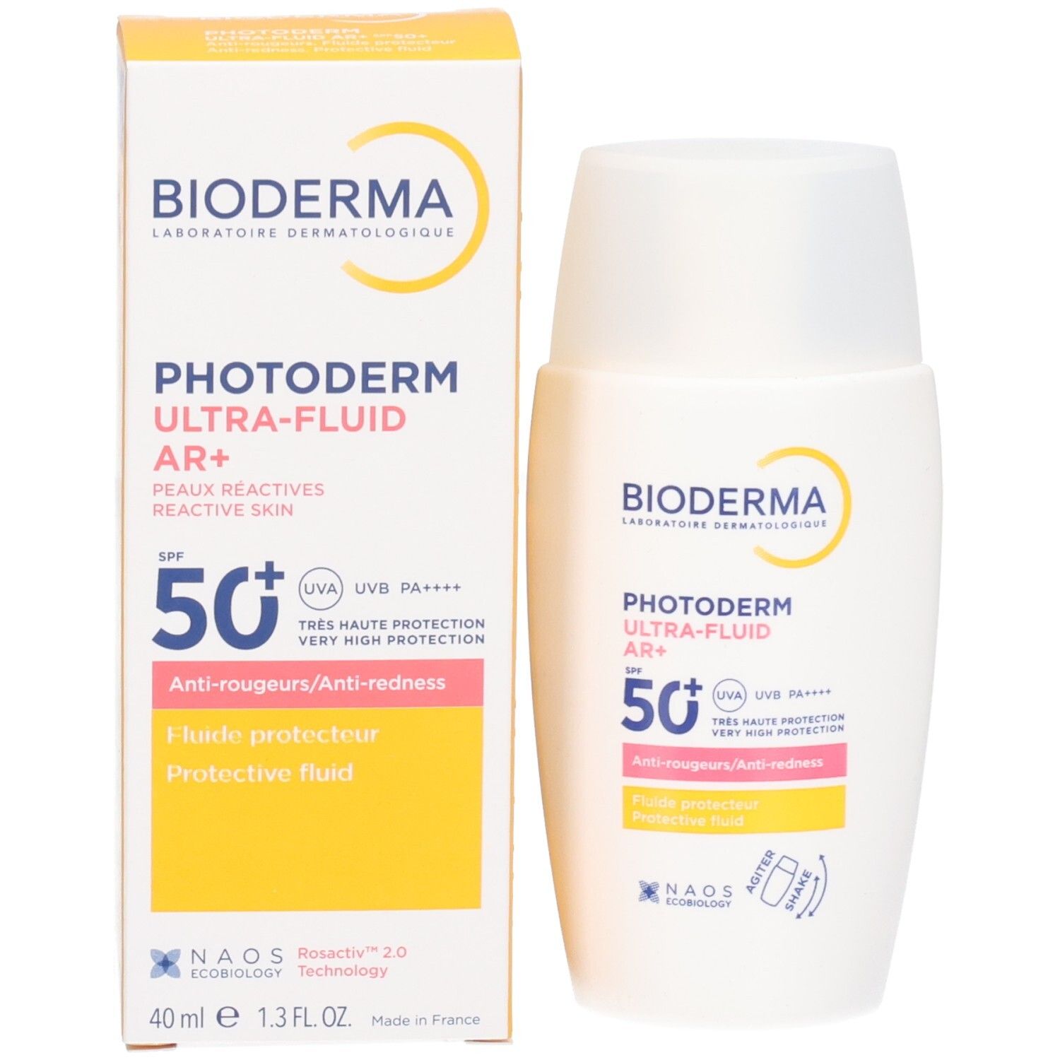 Produkt und Schachtel. Weiße Flasche mit gelber Schachtel. Aufschrift: Bioderma, Photoderm Ultra-Fluid AR+, SPF 50+.