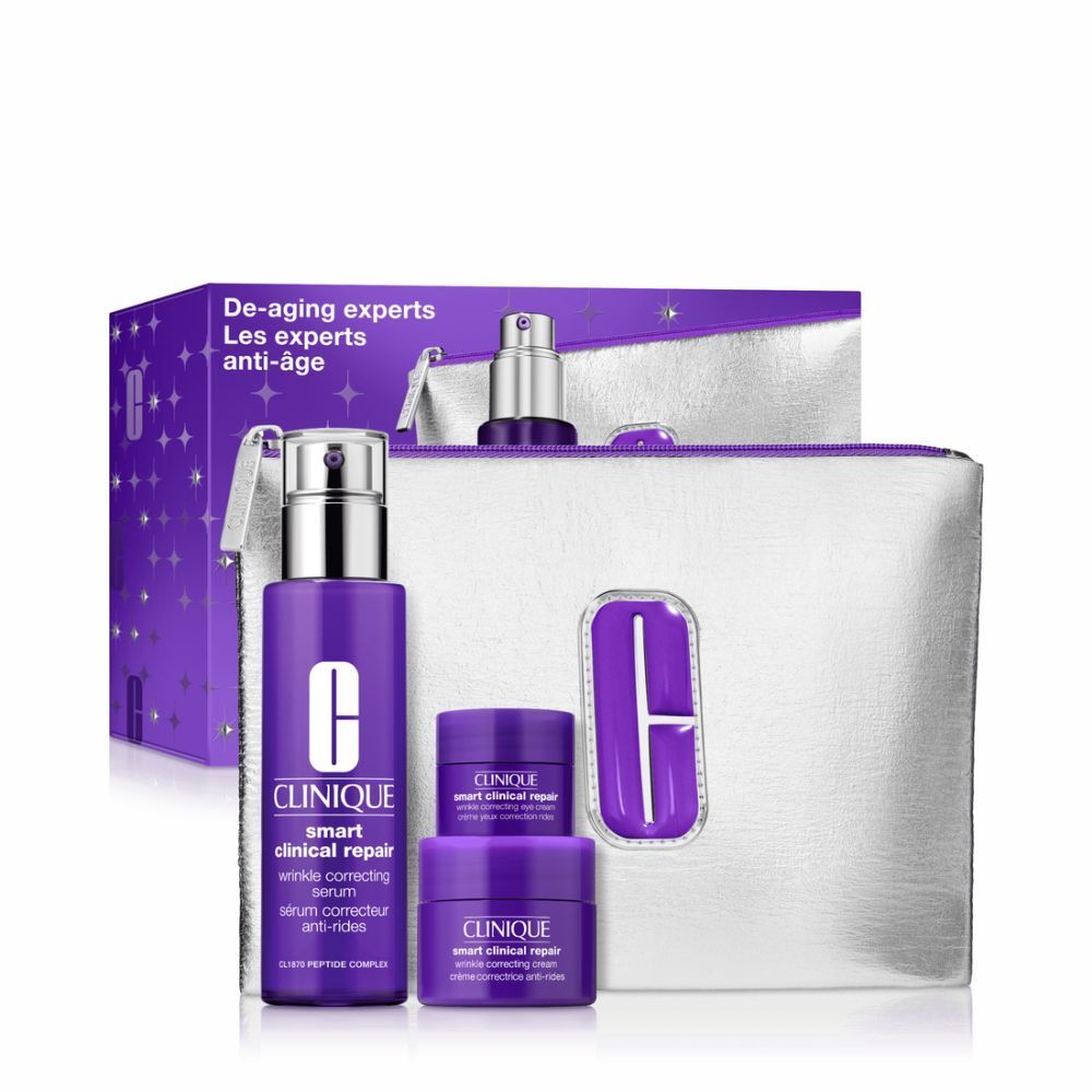Kosmetikset mit lila Flaschen, Tiegeln und silberner Kosmetiktasche. Text: Clinique, Smart Clinical Repair.