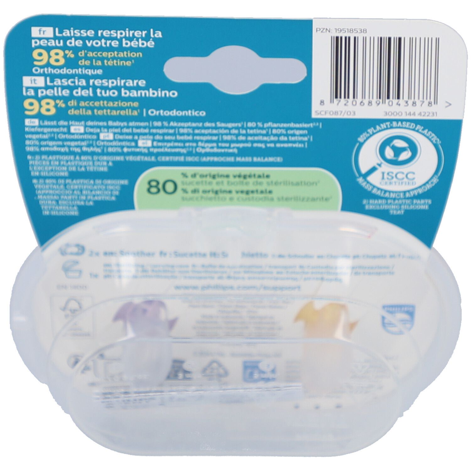 Rückseite der Verpackung mit Produktinformationen und Zertifizierungen. Transparente Box mit zwei Schnullern, gelb und lila, sichtbar.