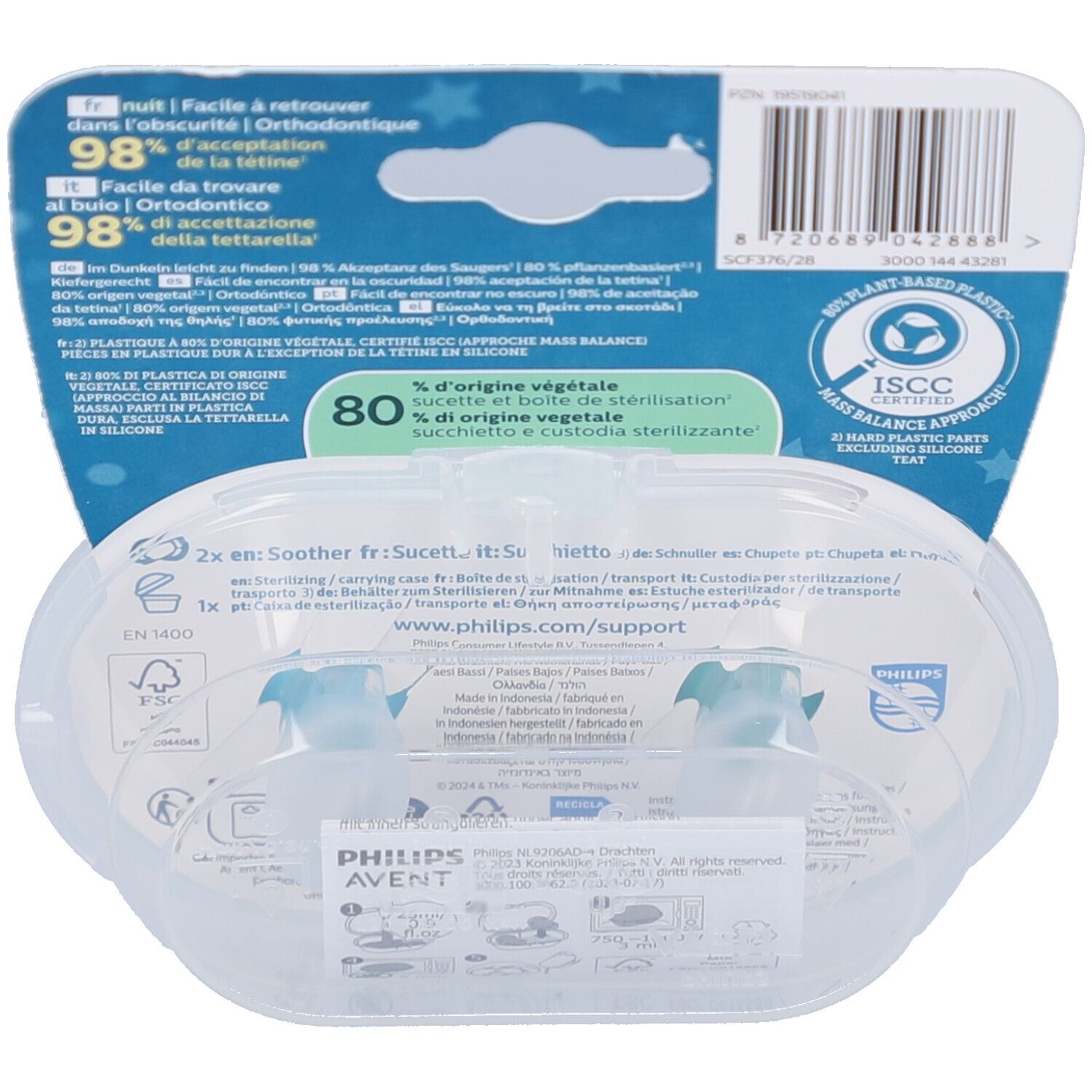 Rückseite der Verpackung mit Produktinformationen. Transparente Aufbewahrungsbox mit zwei Schnullern. Text in verschiedenen Sprachen, Markenlogo und Zertifizierungen.