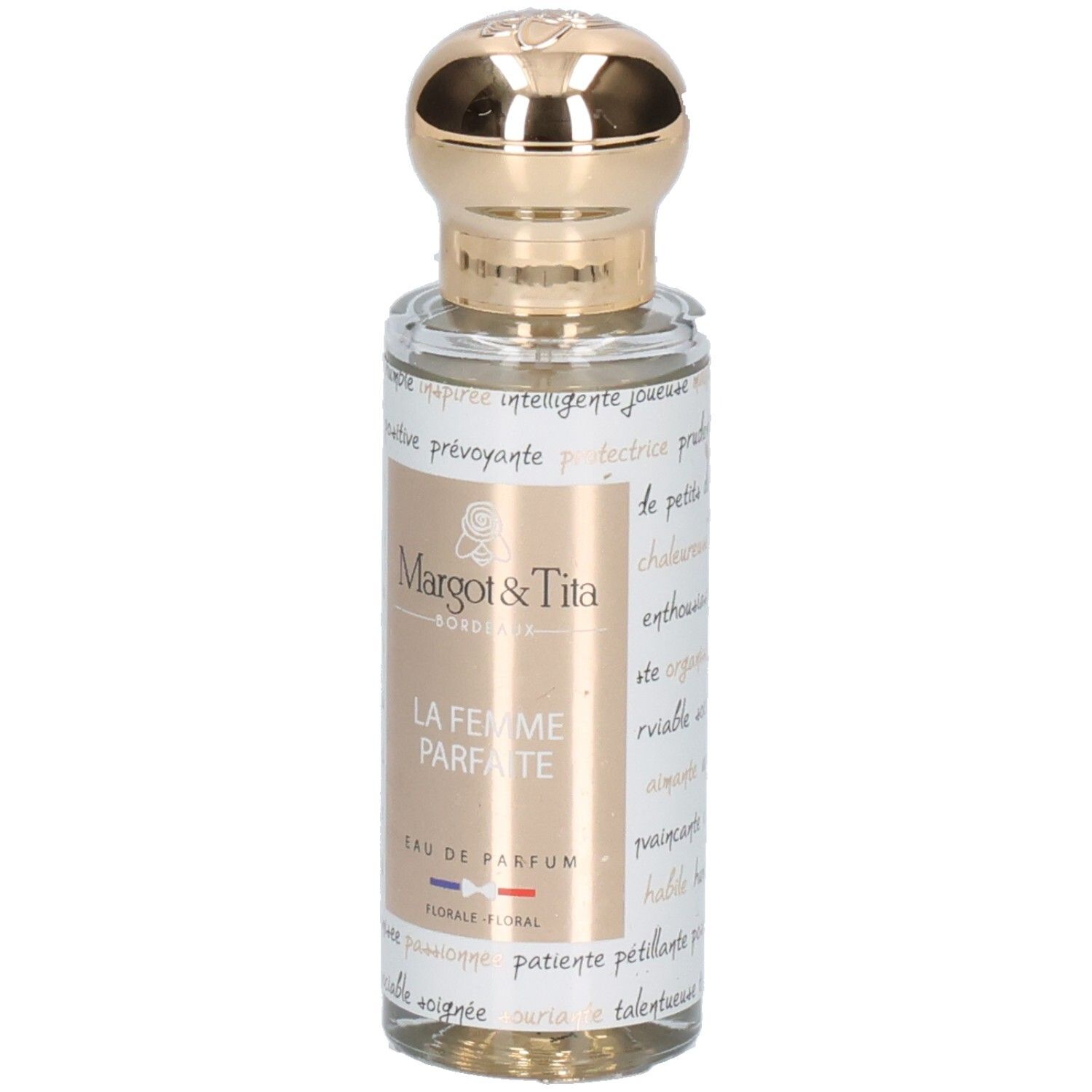 Flacon en verre avec bouchon doré, étiquette 'Margot & Tita LA FEMME PARFAITE EAU DE PARFUM FLORALE FLORAL'.