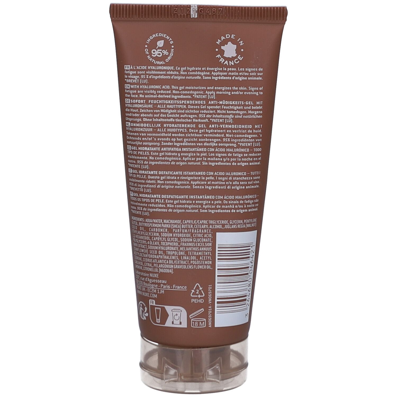 Rückseite der braunen Tube. Text in mehreren Sprachen, Inhaltsstoffe und Barcode. Transparenter Verschluss.