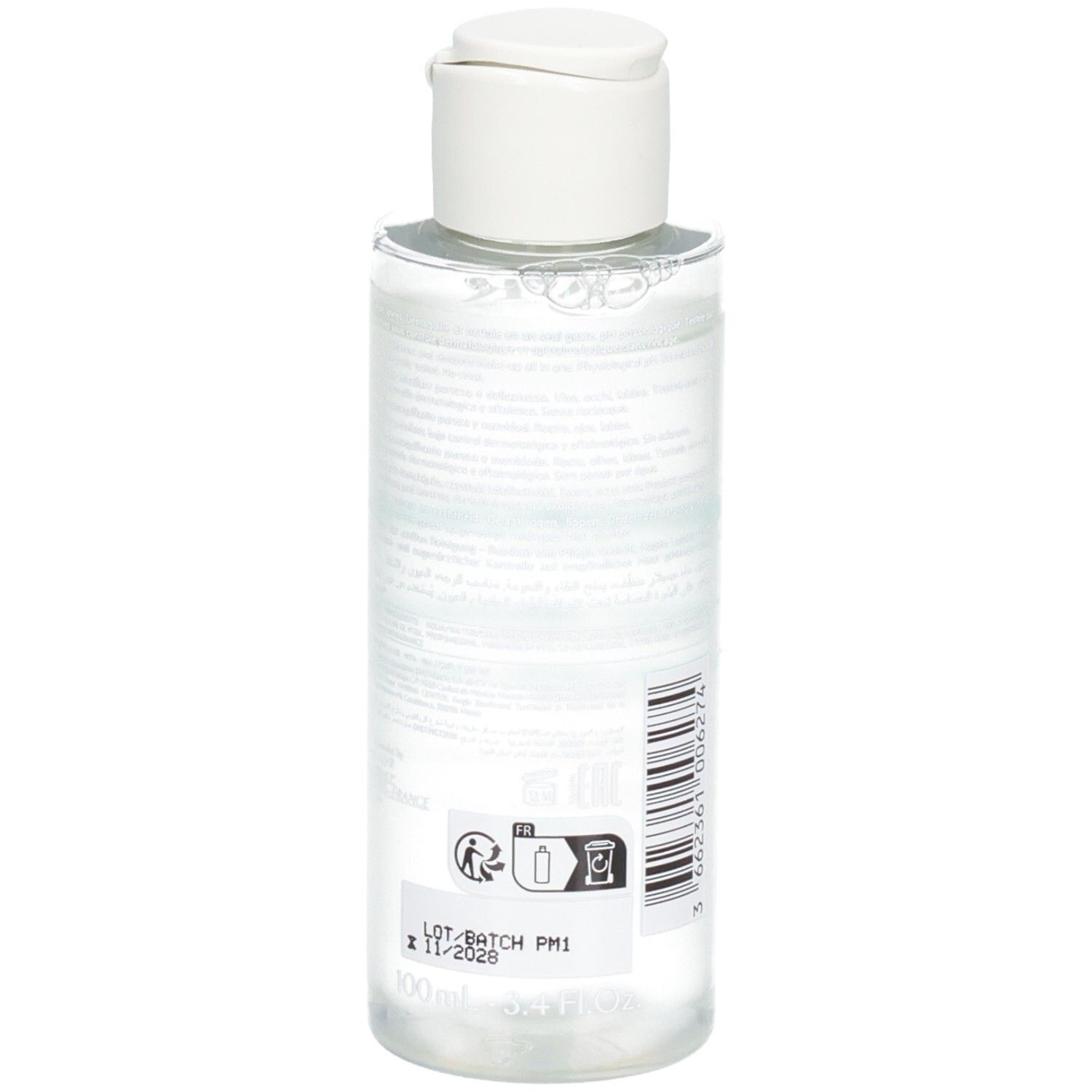 Rückansicht einer transparenten Flasche mit weißem Deckel. Barcode, Text und Symbole auf dem Etikett. Produktname: SVR Eau Micellaire Physiopure.