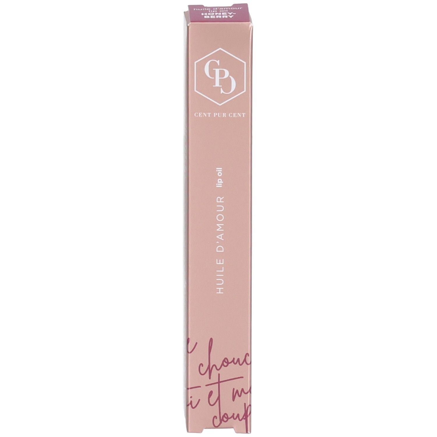 Rosa Verpackung für Lippenöl. Auf der Verpackung sind Logo, Produktname und Schriftzüge zu sehen.