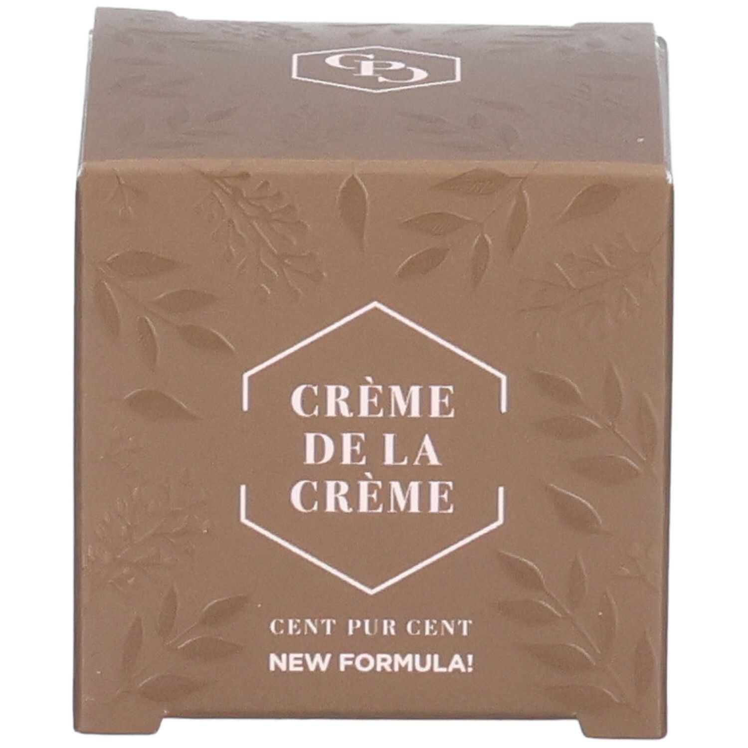Braune Verpackung mit geprägten Blättern. Text: Crème de la Crème, Cent Pur Cent, New Formula. Logo oben.