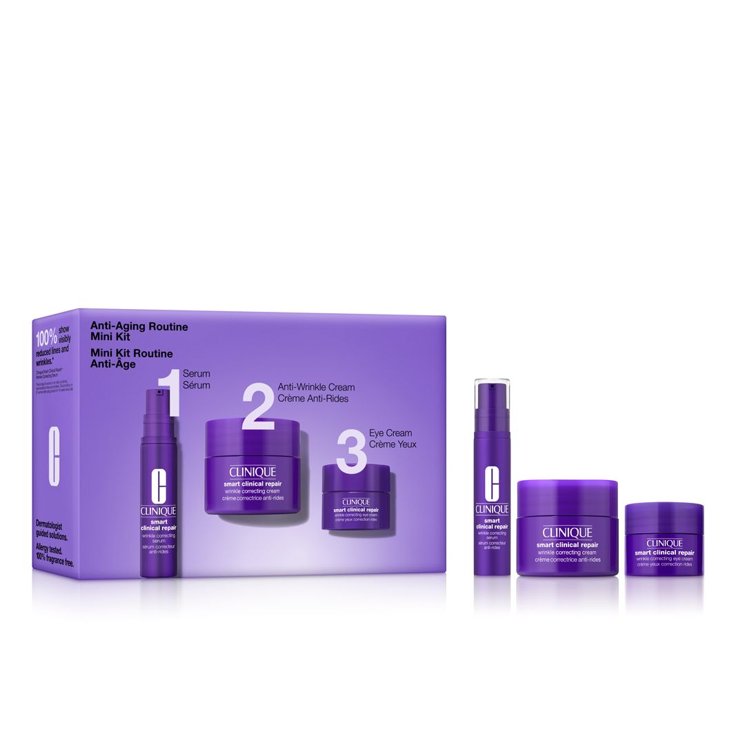 Clinique Mini Kit Routine Anti-Âge. Lila Verpackung mit 3 Produkten und Serum. Aufschrift: Anti-Aging Routine Mini Kit.