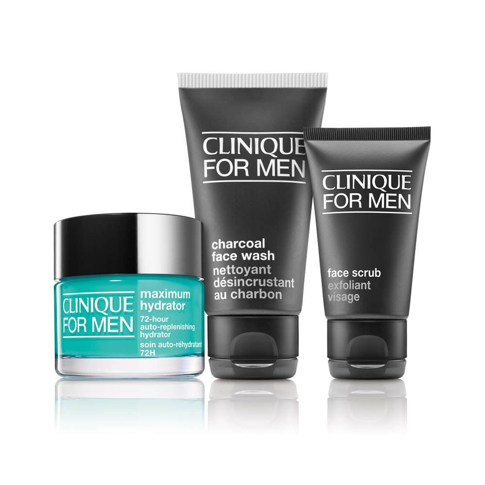 Ein Set von Clinique for Men Hautpflegeprodukten: Feuchtigkeitscreme, Gesichtsreiniger und Peeling.