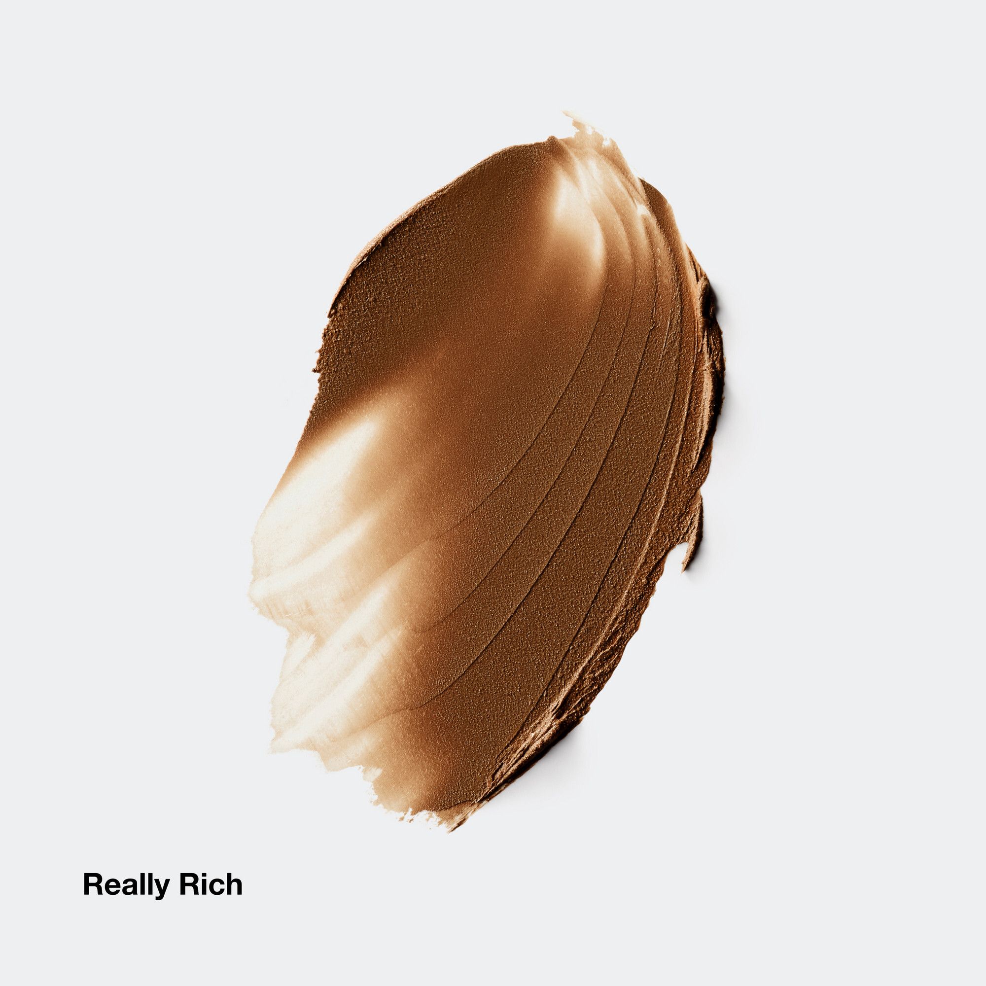 Brauner Farbton von Clinique Chubby Stick. Produktname und Farbtonbezeichnung 'Really Rich' sichtbar.
