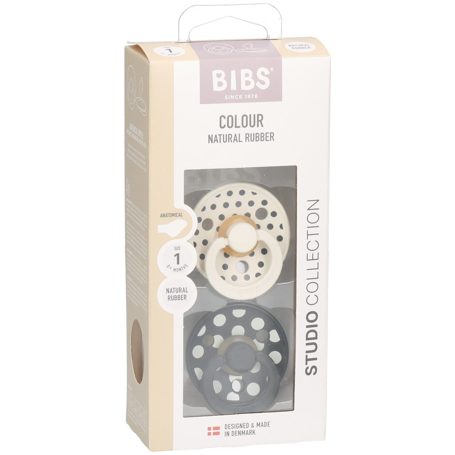 Verpackung mit zwei Schnullern. Marke BIBS. Polka-Dot-Design. Anatomischer Sauger. Naturkautschuk. Farbe: Schwarz und Creme.
