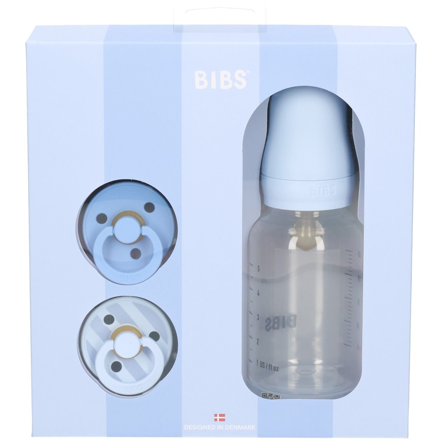 Blaues Geschenkset mit Flasche und Schnullern. Marke BIBS. Verpackung mit Sichtfenster.