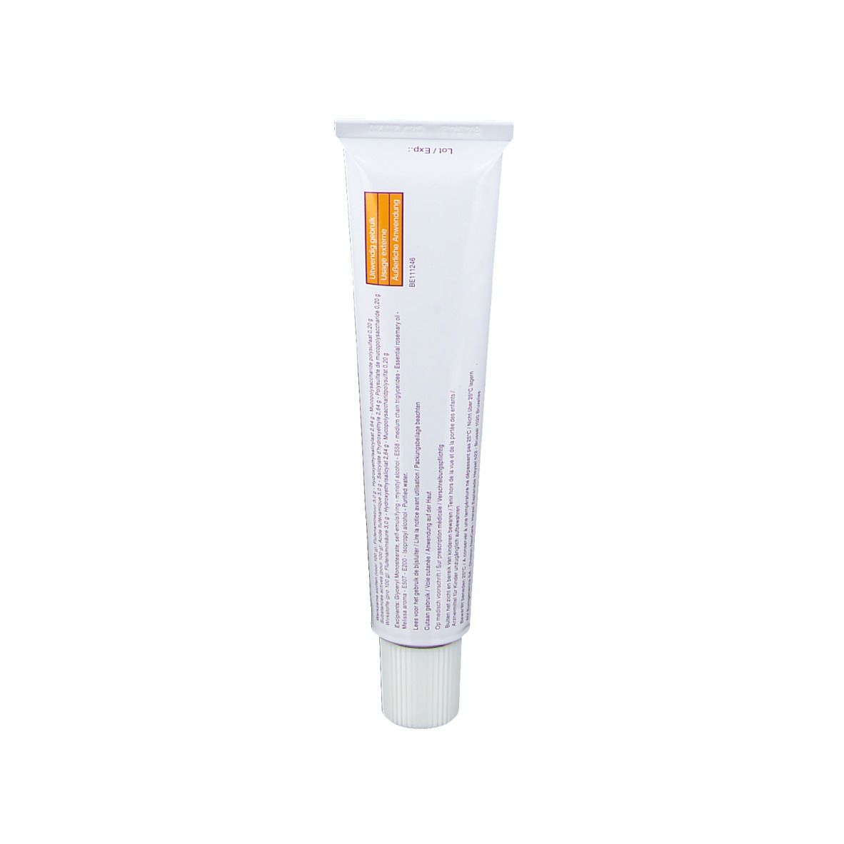 Dos d'un tube de crème. Texte multilingue, zone orange.