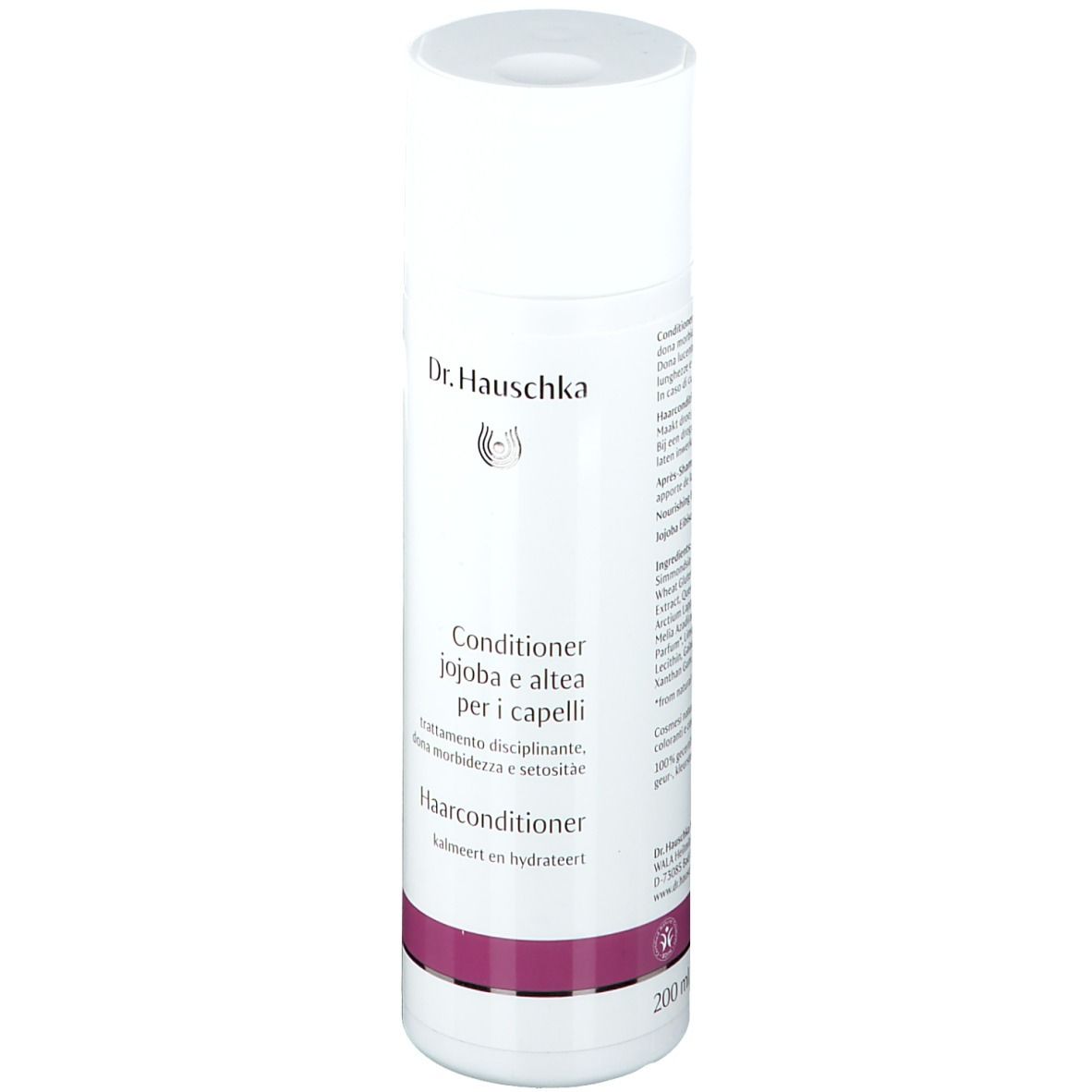 Flacon blanc et violet. Inscription : Dr. Hauschka, Après-shampooing, Jojoba et guimauve pour cheveux.