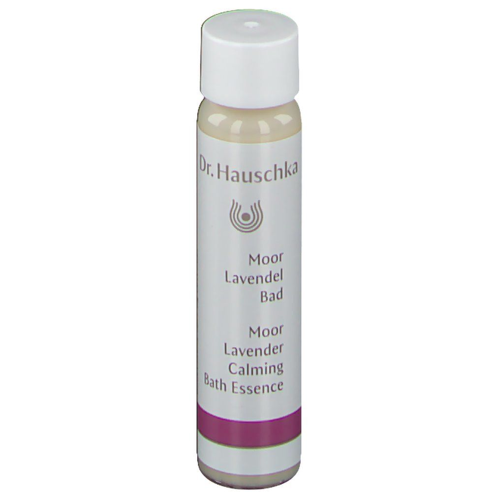 Petite bouteille cylindrique avec bouchon blanc. Inscription : Dr. Hauschka, Moor Lavendel Bad, Moor Lavender Calming Bath Essence.