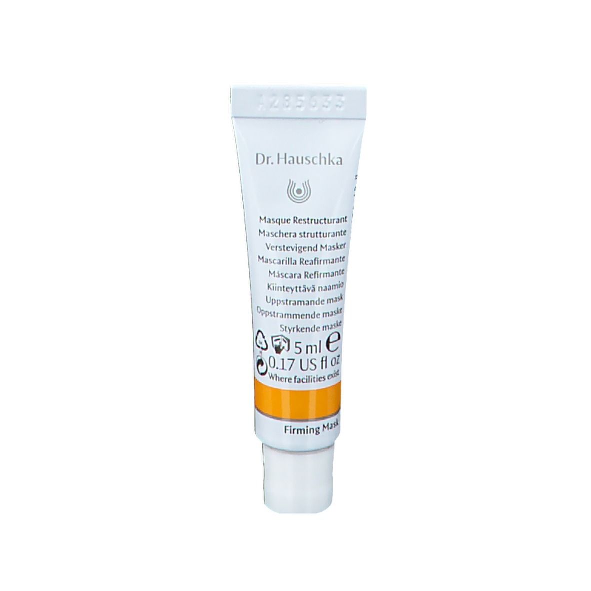Petit tube avec bande jaune. Inscription: Dr. Hauschka, Masque Restructurant, 5ml.