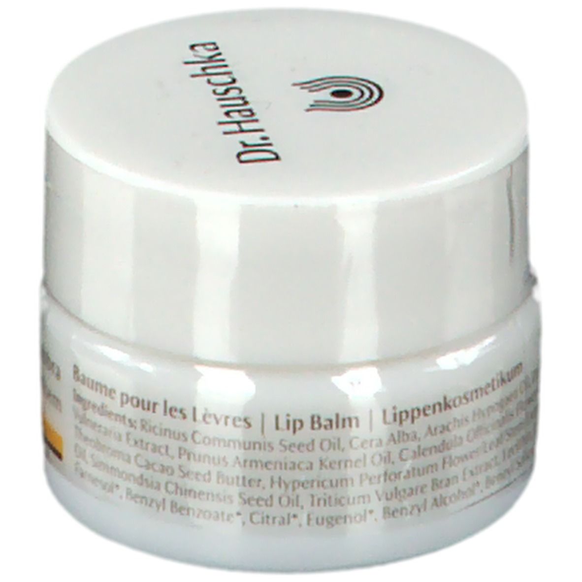 Witte pot met deksel. Opschrift: Dr. Hauschka. Opschrift: Baume pour les Lèvres, Lip Balm, Lippenkosmetikum. Ingrediëntenlijst.