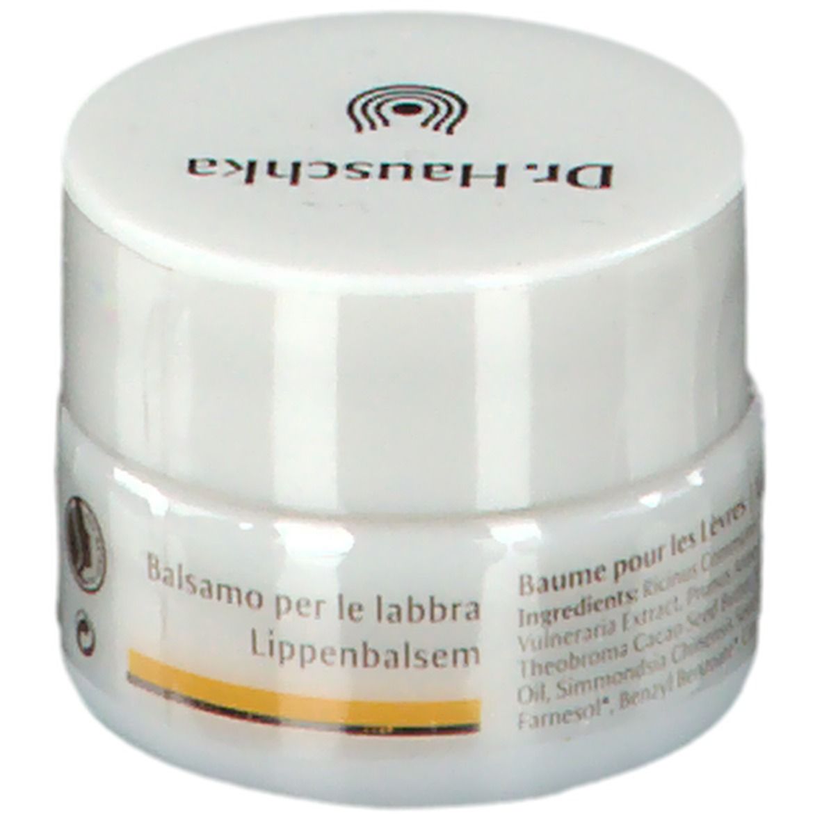 Witte pot met deksel. Opschrift: Dr. Hauschka, Balsamo per le labbra, Lippenbalsam. Gele streep.