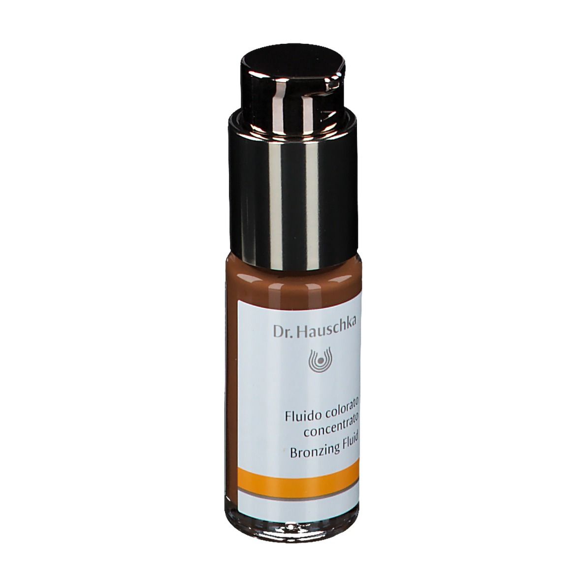 Flacon en verre avec pompe contenant un liquide brun. Inscription: Dr. Hauschka, Fludio colorato concentrato, Bronzing Fluid.