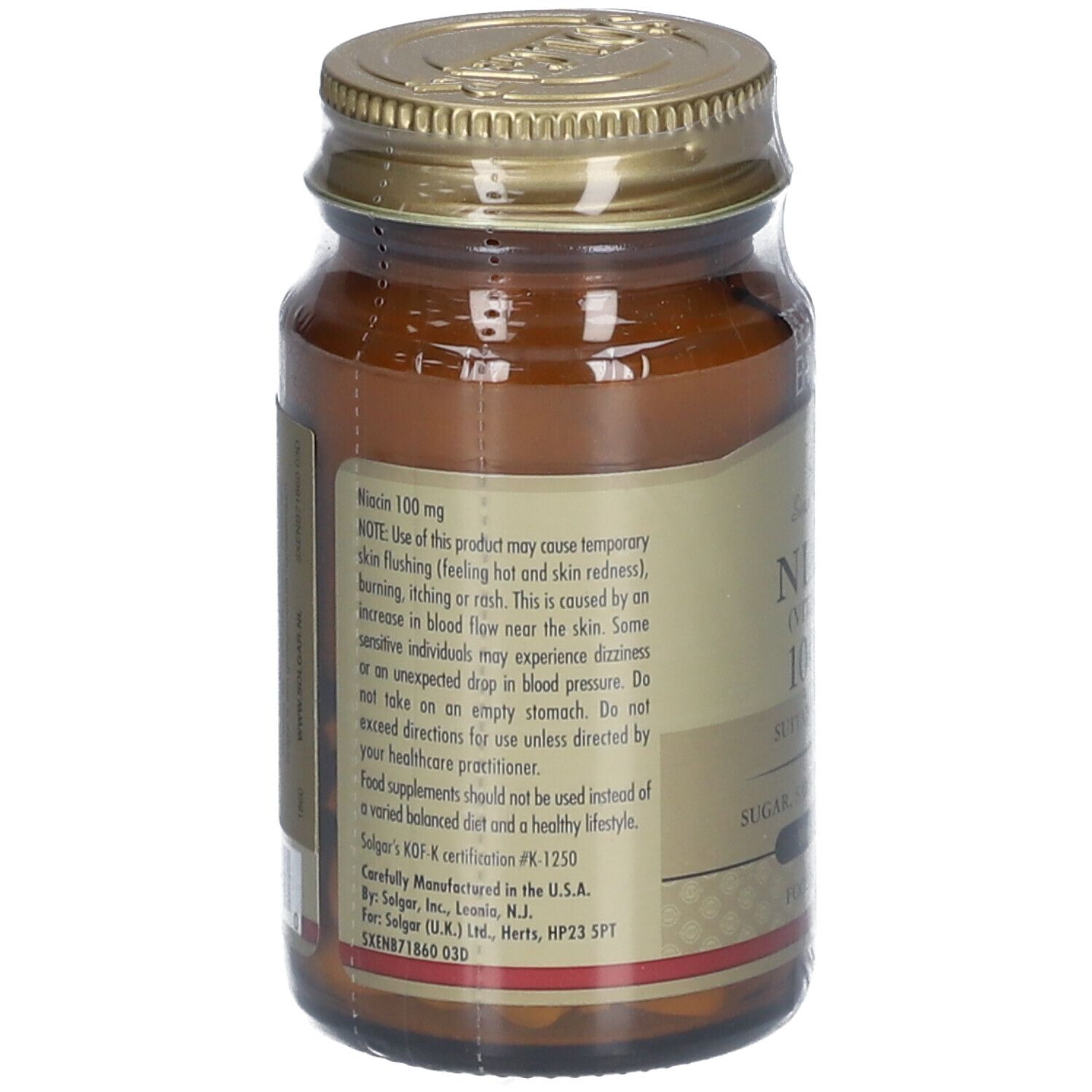 Achterkant bruine glazen fles. Etiket met tekst over niacine 100 mg. KOF-certificering. Fabrikantinformatie.