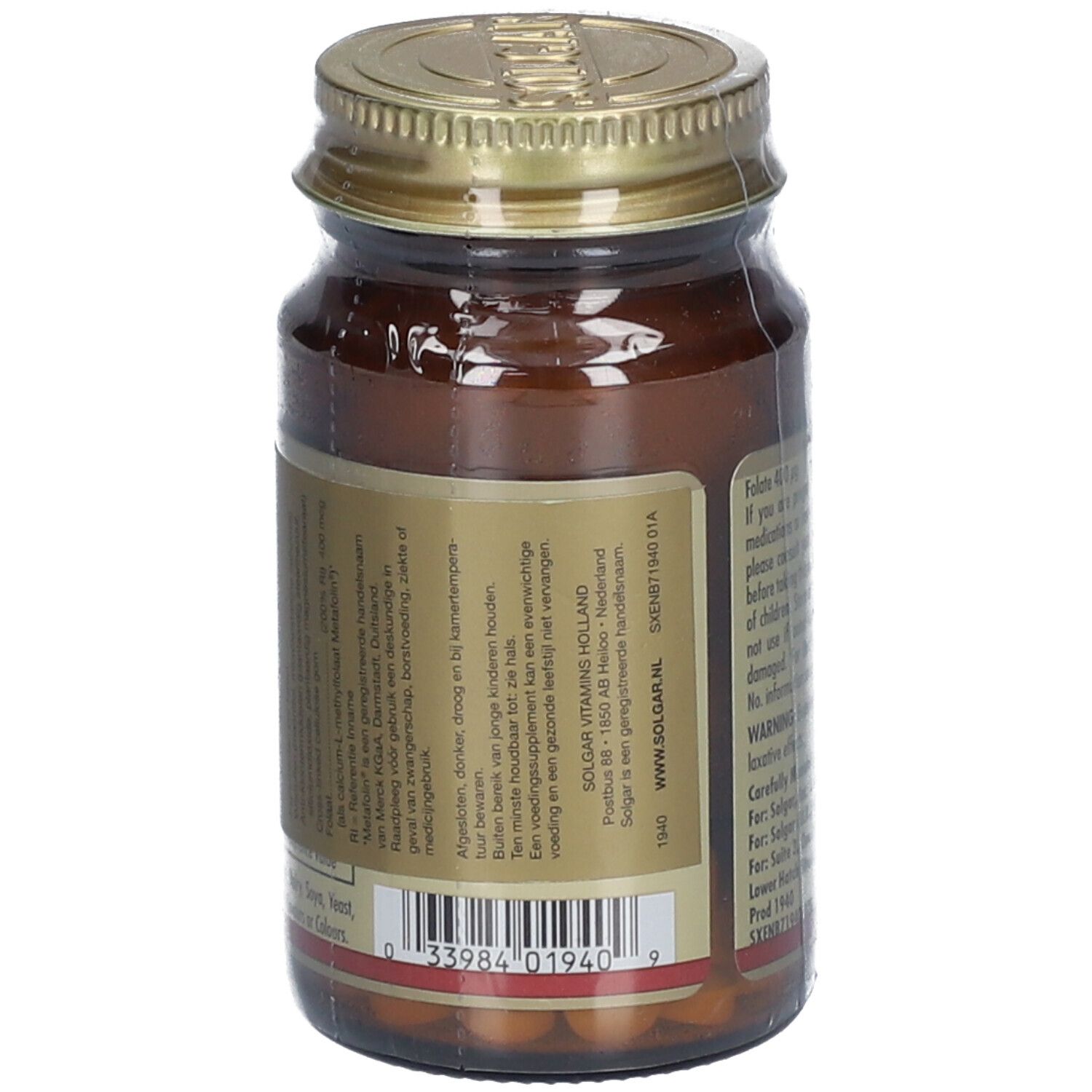 Dos d'un flacon en verre brun avec bouchon doré. Étiquette avec informations sur l'acide folique, fabricant et code-barres.