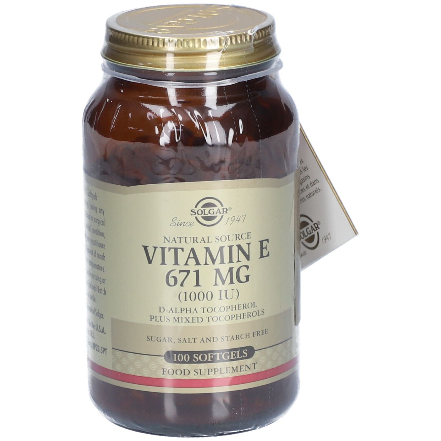 Bruine glazen fles met gouden deksel. Etiket met "Solgar" en "Vitamine E 671 mg (1000 IE)". Bevat 100 softgels.