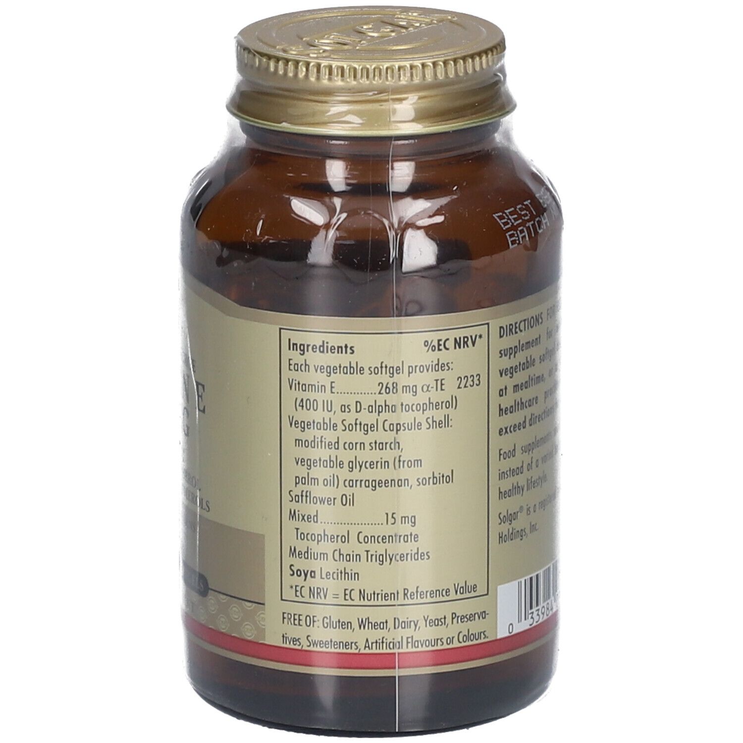 Achterkant van de bruine glazen fles. Etiket met ingrediënten: Vitamine E, gemodificeerd maïszetmeel, zonnebloemolie, etc. EC NRV.