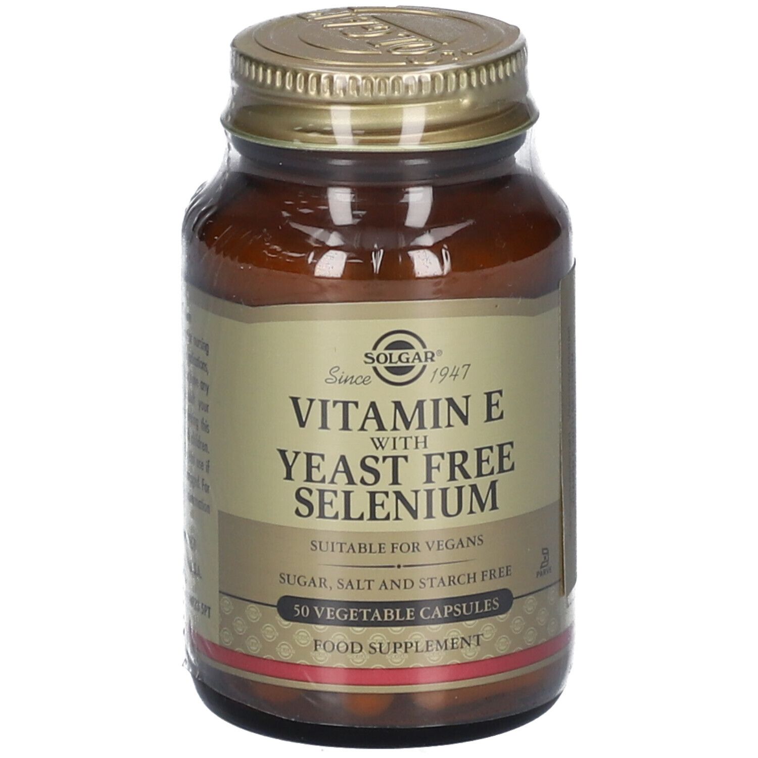 Flacon en verre brun avec couvercle doré. Inscription : Vitamin E with Yeast Free Selenium. Convient aux végétaliens.