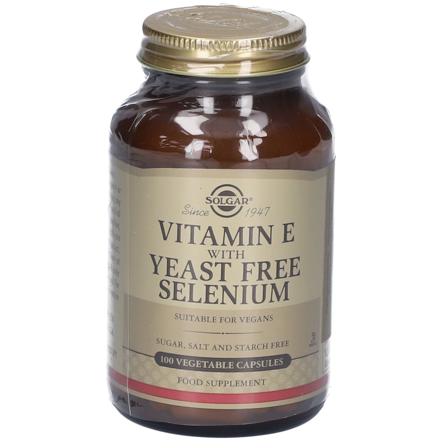 Flacon en verre brun avec couvercle doré. Inscription : Vitamine E avec sélénium sans levure. Convient aux végétaliens. 100 gélules.