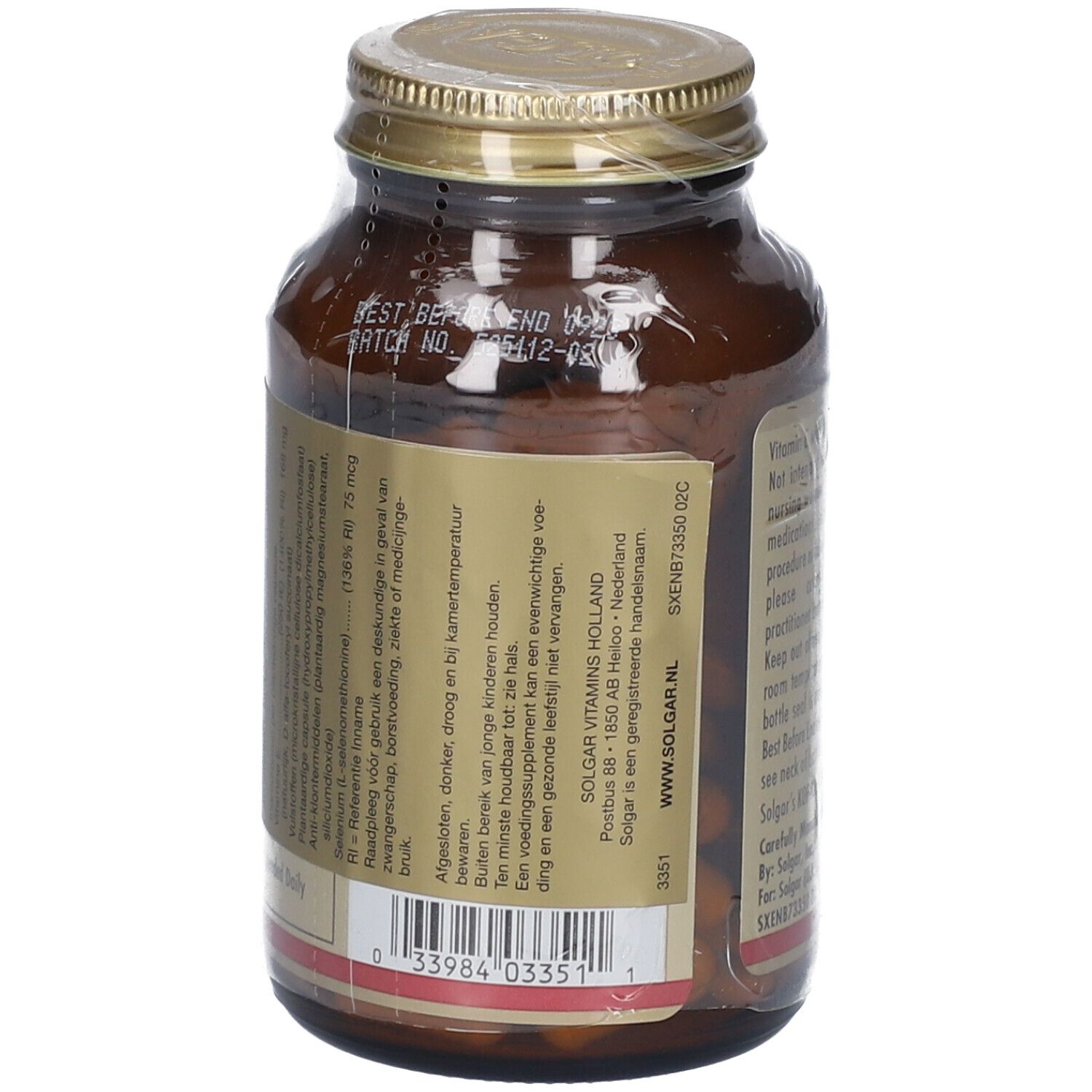 Dos du flacon. Texte : Vitamine E avec sélénium sans levure. Informations de stockage. Numéro de lot et date de péremption.