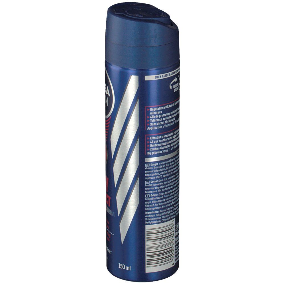 Bombe aérosol bleue. Texte sur le côté : DRY IMPACT PLUS, 150ml. Informations et avertissements.