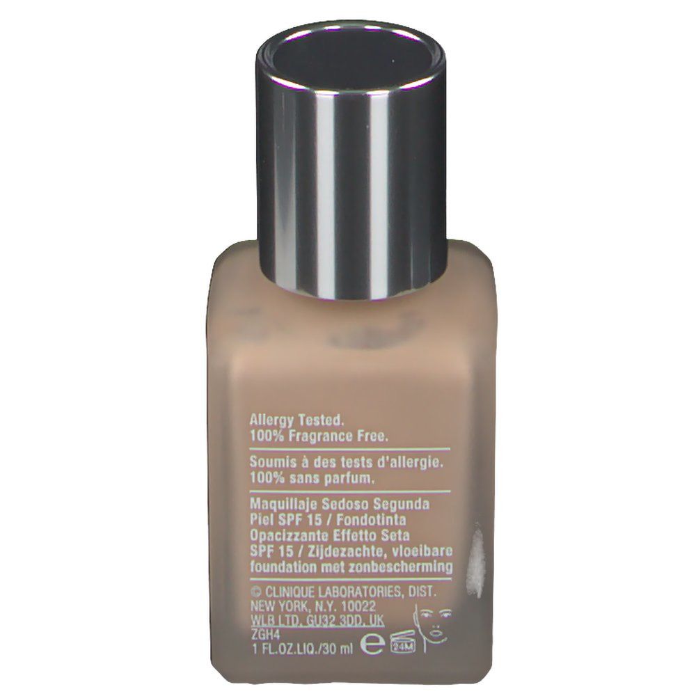 Rückseite des Make-up-Flakons. Text: Allergy Tested, 100% Fragrance Free. Inhaltsangaben in mehreren Sprachen. 1 FL.OZ.LIQ./30 ml.