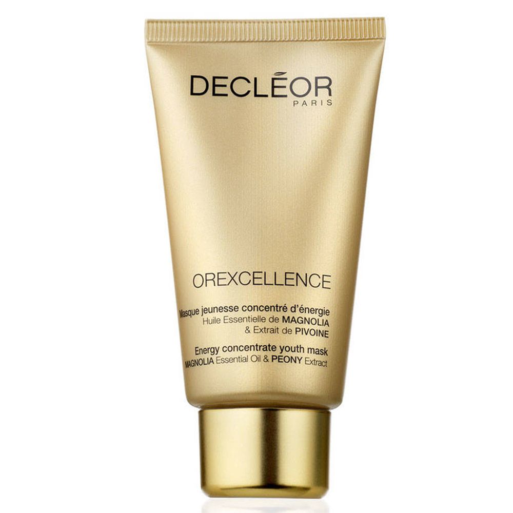 Tube doré avec nom du produit et texte. OREXCELLENCE, DECLÉOR PARIS. Désignations de produits en anglais et en français.