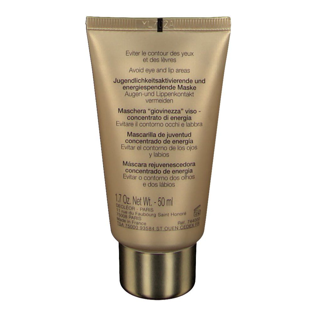 Dos du tube doré. Désignations de produits en plusieurs langues. Bouchon à vis doré. 50 ml.
