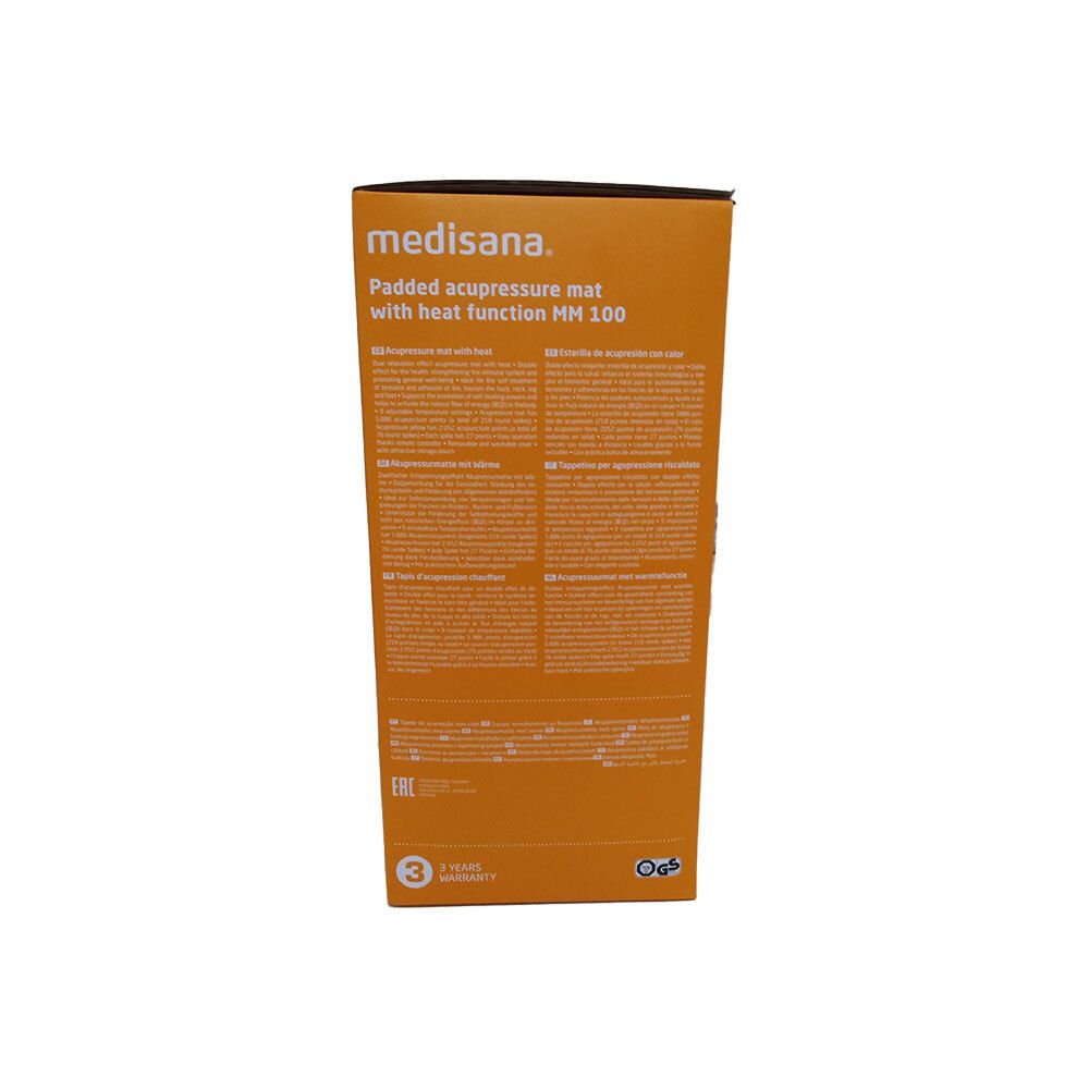 Rückseite der Verpackung Medisana MM 100 Massagemat 1st. Produktname und Beschreibung. Garantiehinweis. Text in mehreren Sprachen.