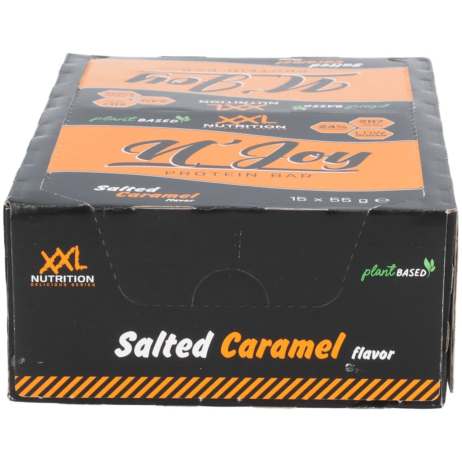 Schwarzer Karton mit orangefarbenem Deckel. Aufschrift: N'Joy Protein Bar, Salted Caramel. XXL Nutrition Logo. Plant Based. 15 x 55g.