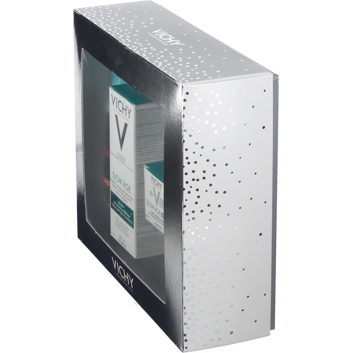 Coffret cadeau argenté avec fenêtre. Contient trois produits. Marque : Vichy. Vue en angle.