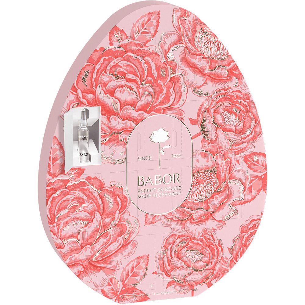 Babor Das Osterei: Ei-förmige Verpackung mit Blumenmuster, Babor Logo und einer Ampulle.