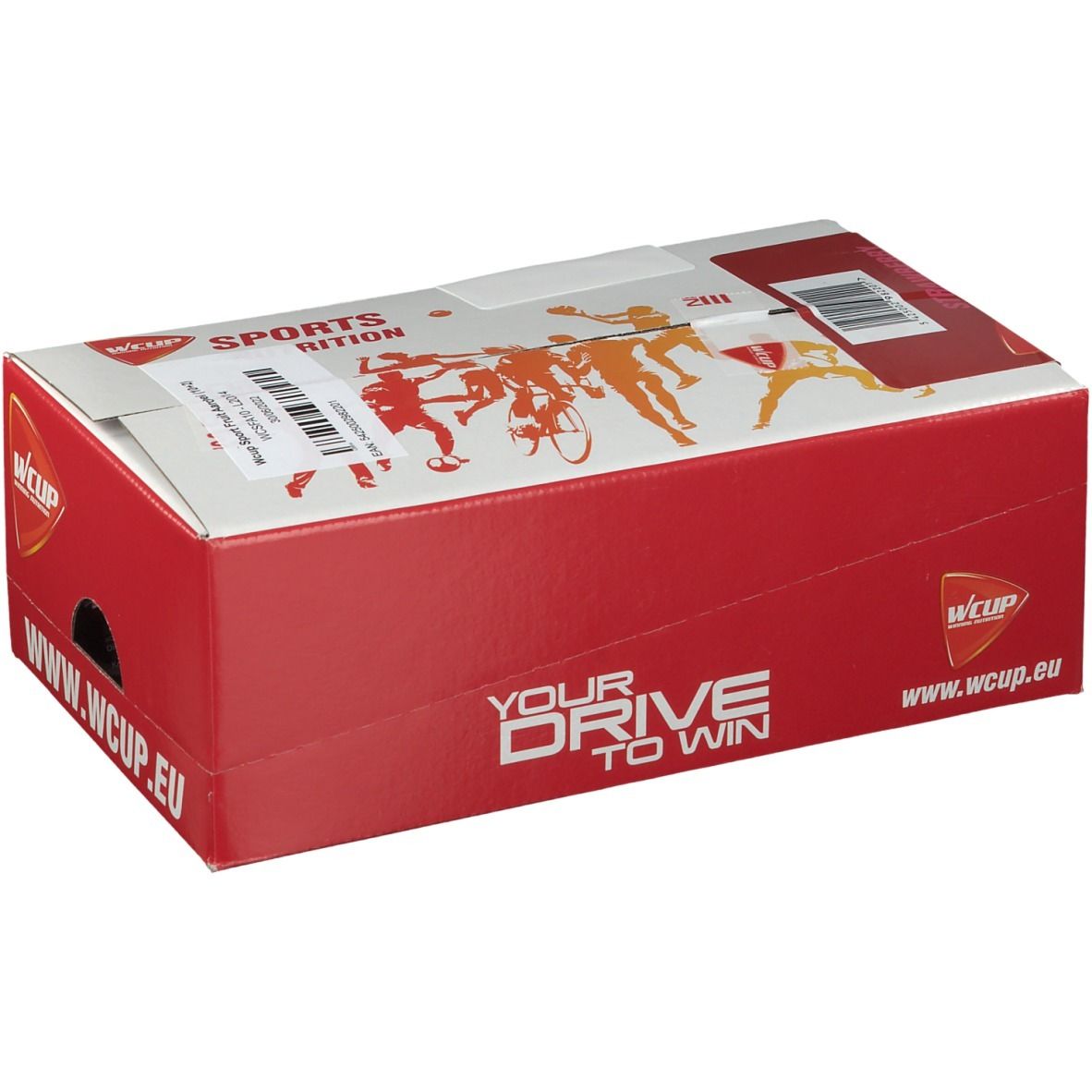 Boîte rouge avec couvercle blanc. Contient WCUP Sports Fruit. Logo et nom du produit sur la boîte. Inscription : YOUR DRIVE TO WIN et www.wcup.eu.