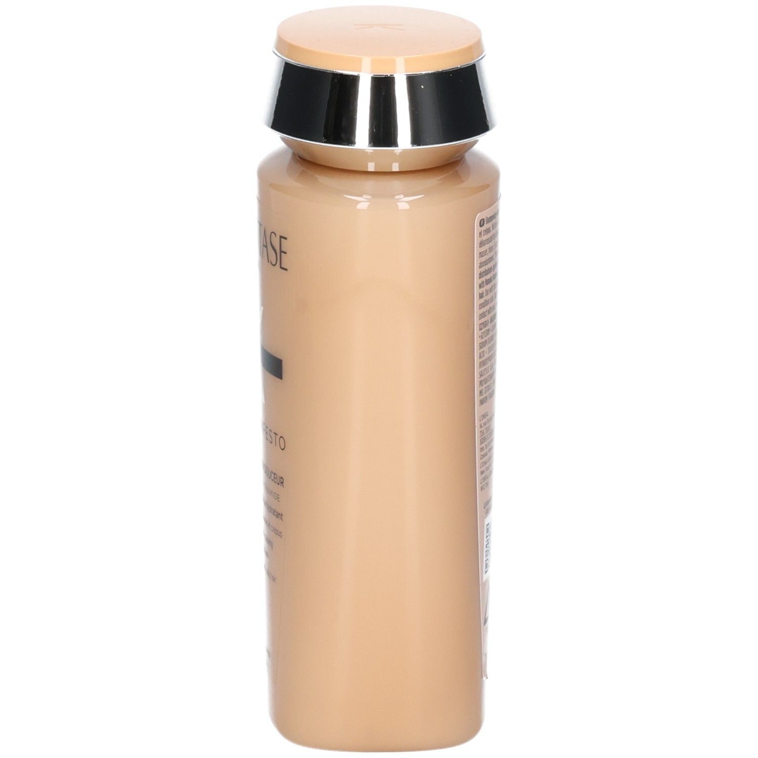 Seitenansicht der Kérastase Curl Manifesto Shampoo-Flasche in Beige.