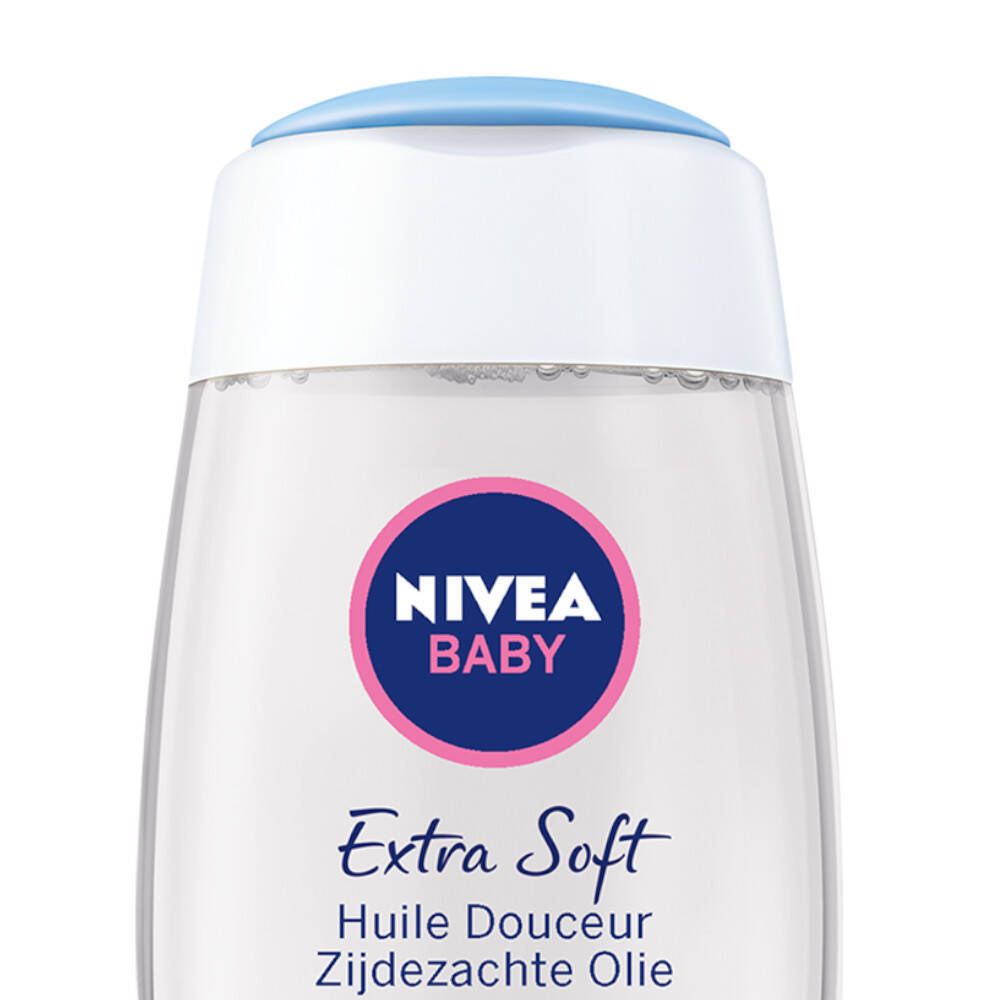 Flasche mit NIVEA BABY Extra Soft Huile Douceur. Weißer Deckel mit blauem Verschluss. Rosa Etikett mit Logo.